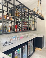 eManzini bar with bottles and glassware